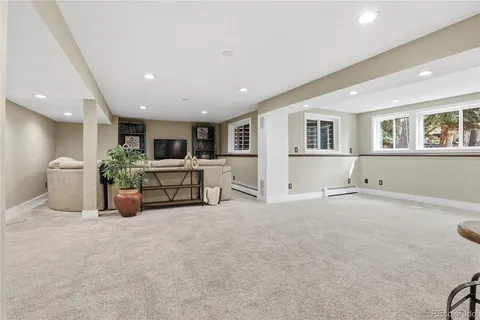 a large room with furniture and windows