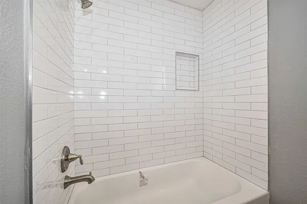 a bathroom with a bathtub