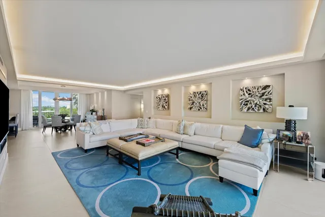 a bathroom with a granite countertop sink double vanity and a mirror