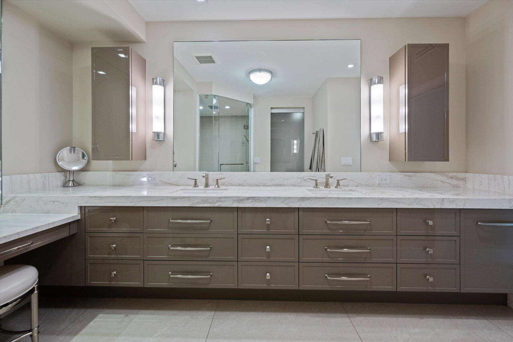 2500 South Ocean Boulevard, Unit 3A3 Palm Beach, FL 33480 - Photo 20 of 39 a bathroom with a granite countertop sink double vanity and a mirror