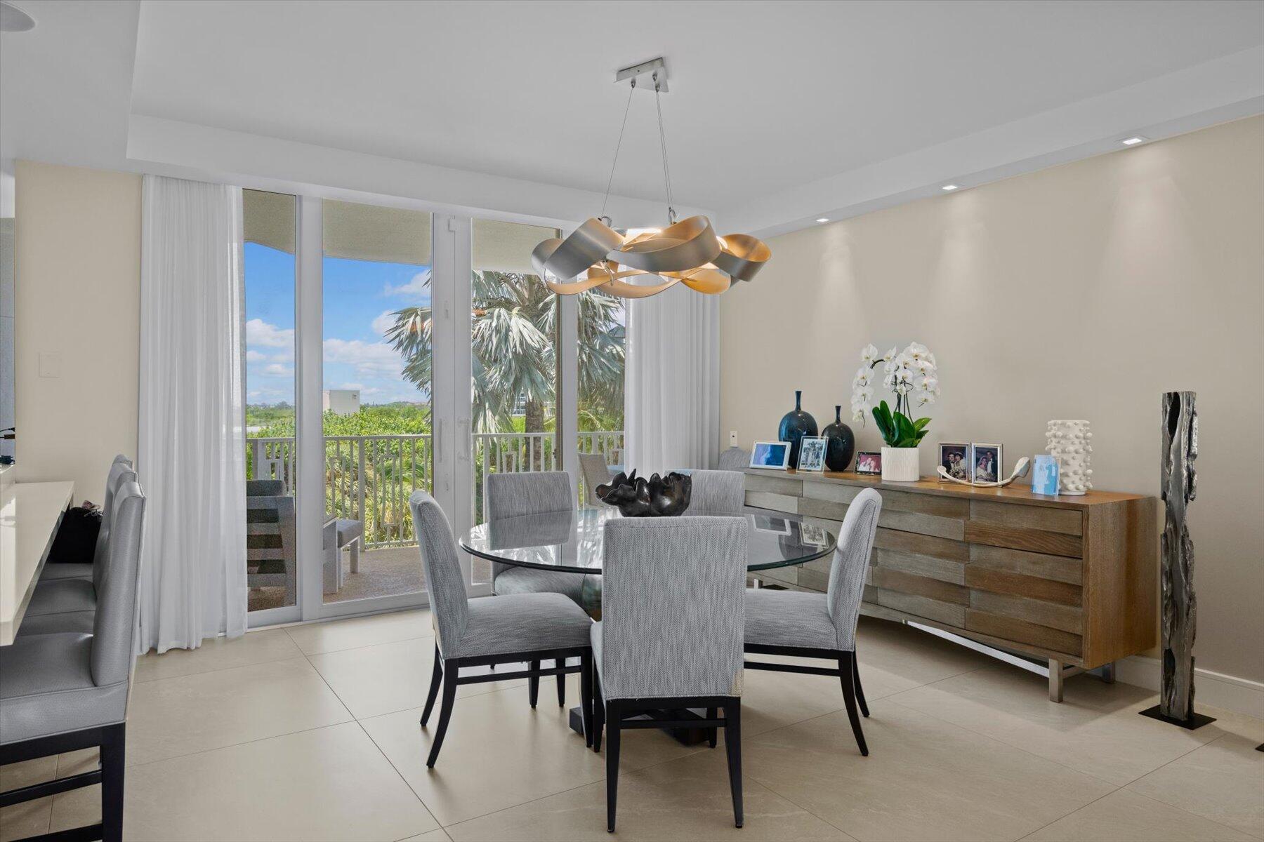 2500 South Ocean Boulevard, Unit 3A3 Palm Beach, FL 33480 - Photo 8 of 39 a view of a dining room with furniture window and outside view