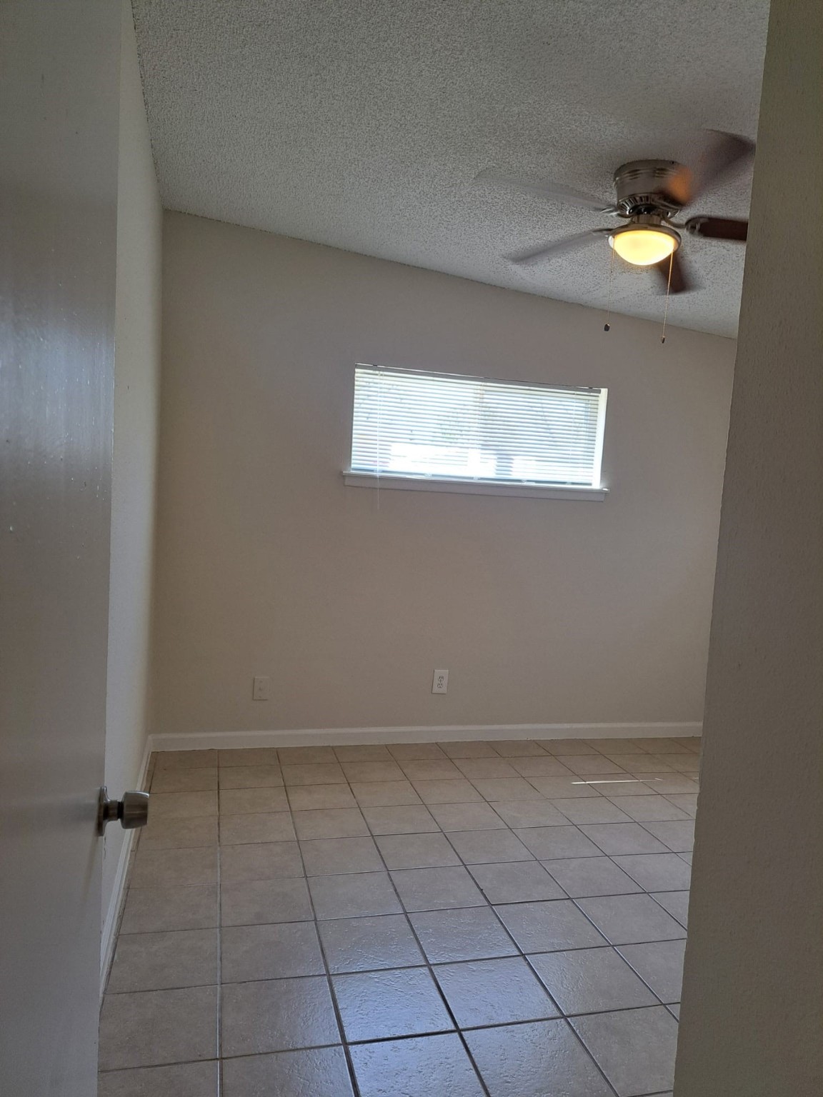 3357 Frick Road, Unit 3 Houston, TX 77086 - Photo 4 of 7 Bedroom 1, no carpet and ceiling fan.