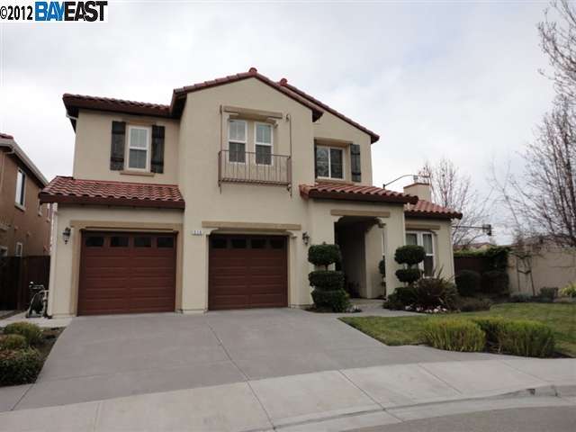 516 Roubaud Court San Ramon, CA 94582 - Photo 1 of 1 a front view of a house with a yard and garage