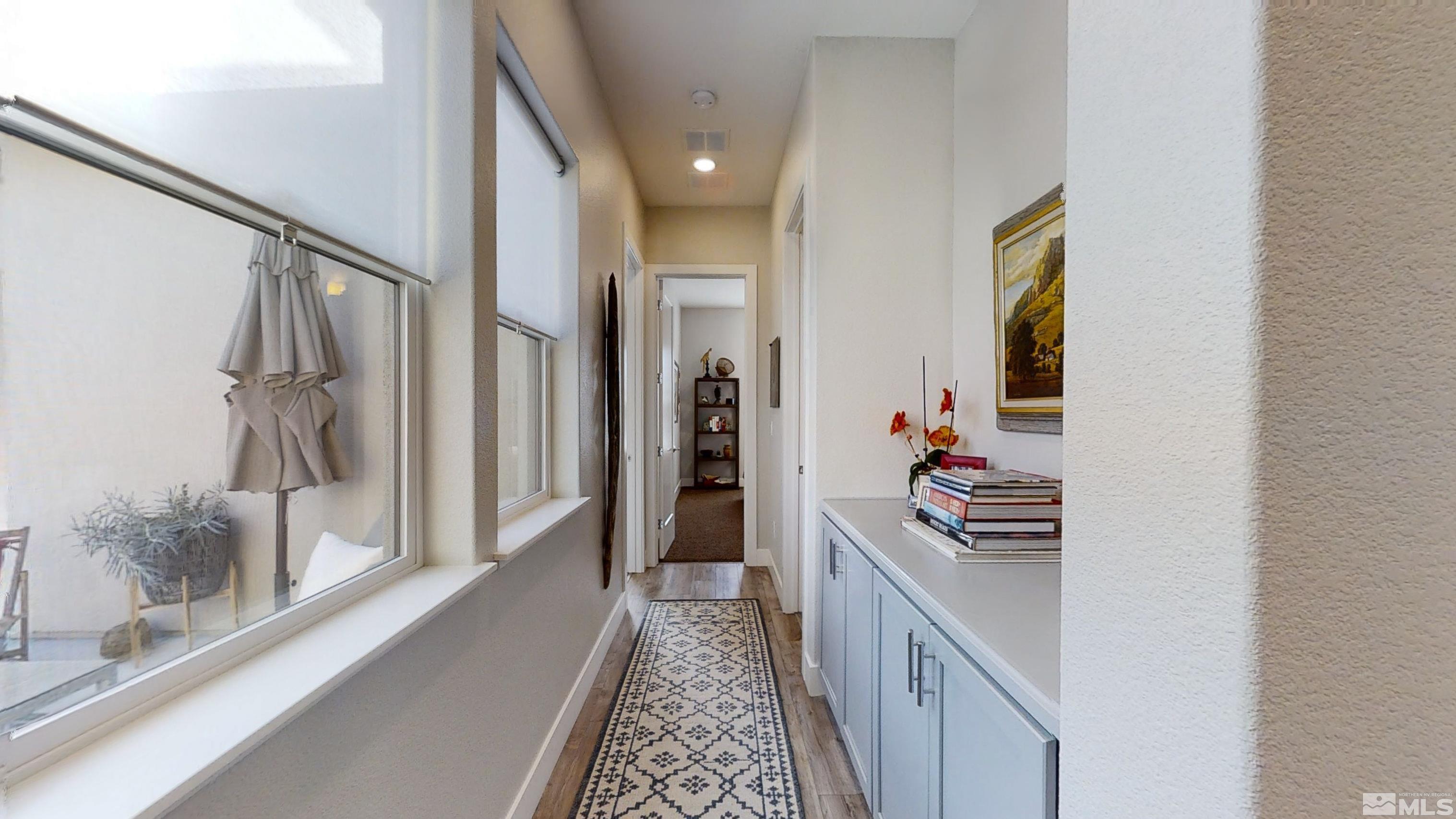8779 Larkhaven Trail Reno, NV 89523 - Photo 20 of 32 a kitchen with a sink and refrigerator