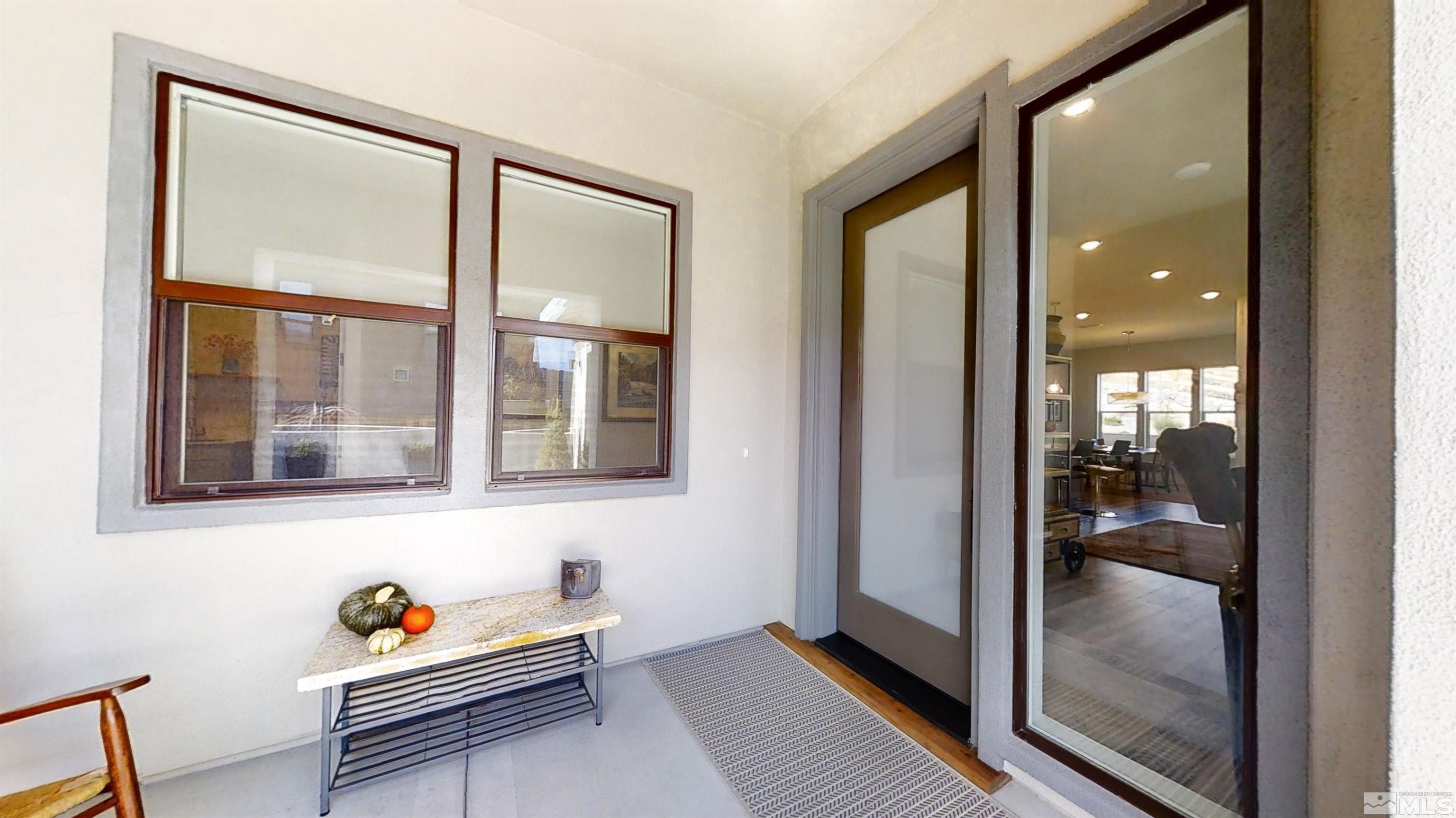 8779 Larkhaven Trail Reno, NV 89523 - Photo 5 of 32 a outdoor space with furniture and windows
