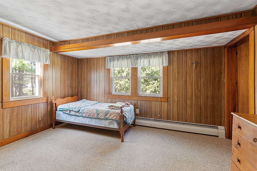 10 R Eagleville Road Orange, MA 01364 - Photo 19 of 29 a spacious bedroom with a bed and a window