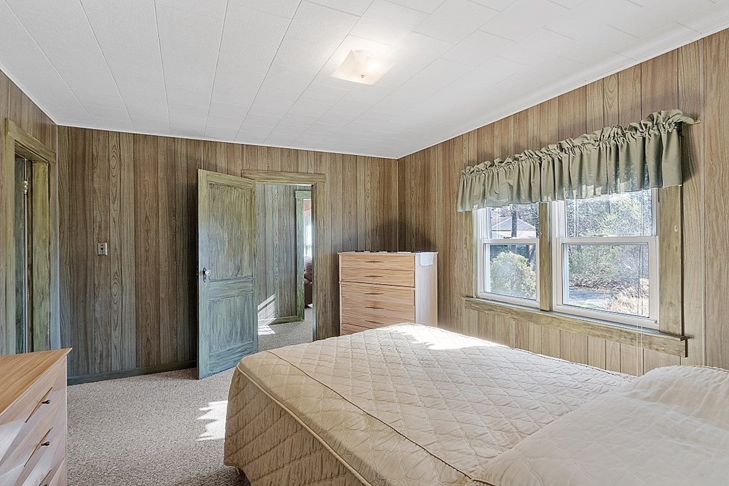 10 R Eagleville Road Orange, MA 01364 - Photo 20 of 29 a bedroom with a large bed and a window