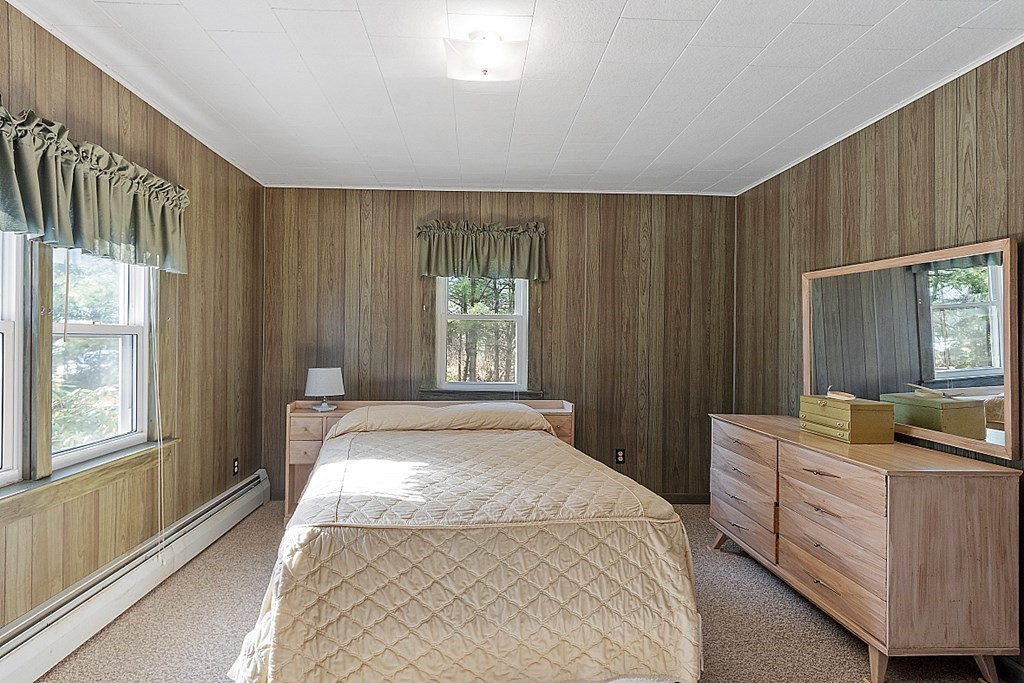 10 R Eagleville Road Orange, MA 01364 - Photo 21 of 29 a bedroom with a bed and a window