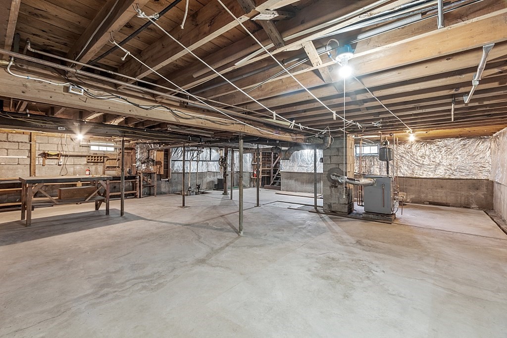 10 R Eagleville Road Orange, MA 01364 - Photo 23 of 29 a view of empty room with wooden ceiling