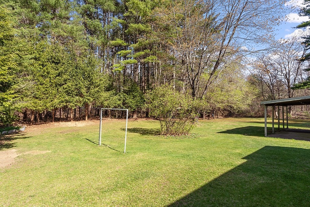 10 R Eagleville Road Orange, MA 01364 - Photo 4 of 29 a view of a backyard with swimming pool