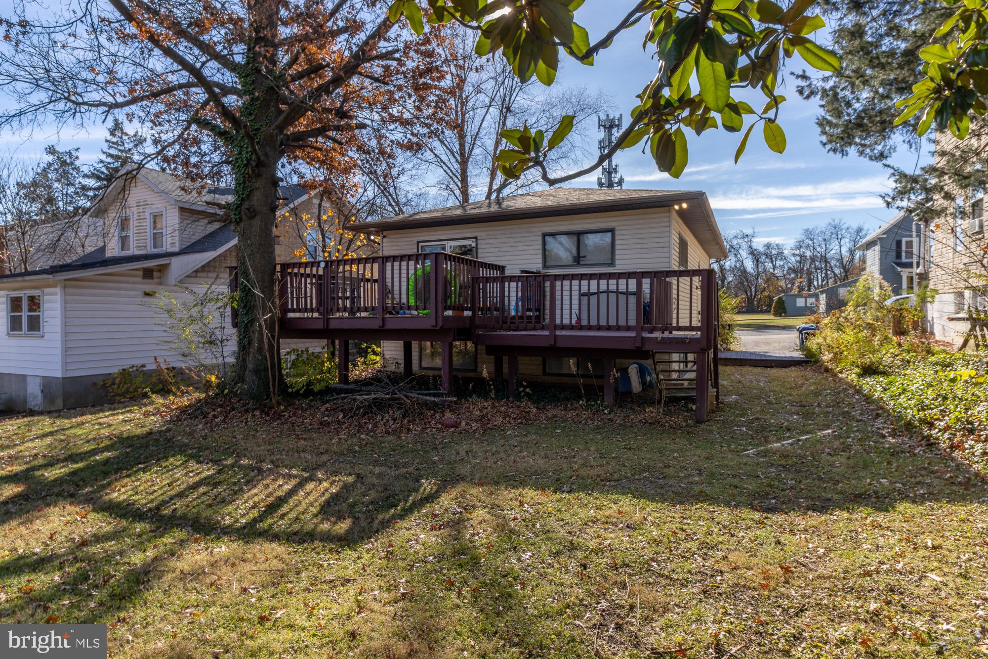 4006 Pinewood Avenue, Unit 1 Baltimore, MD 21206 - Photo 24 of 25 a view of a house with a yard and sitting area