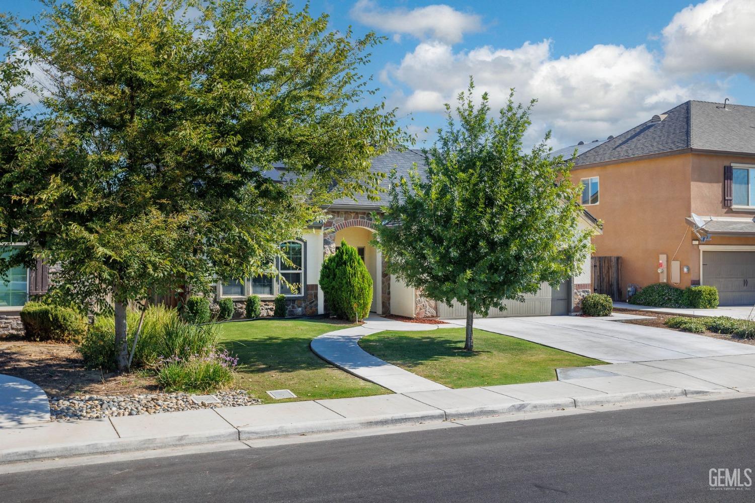 Undisclosed Address Bakersfield, CA 93311 - Photo 1 of 39 a view of a house with a street