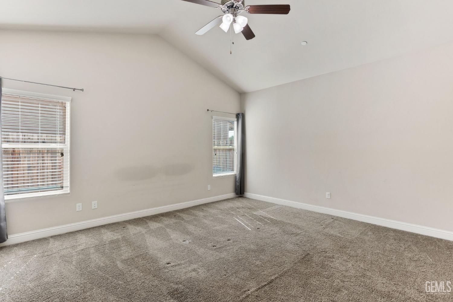 Undisclosed Address Bakersfield, CA 93311 - Photo 23 of 39 a view of an empty room with a window