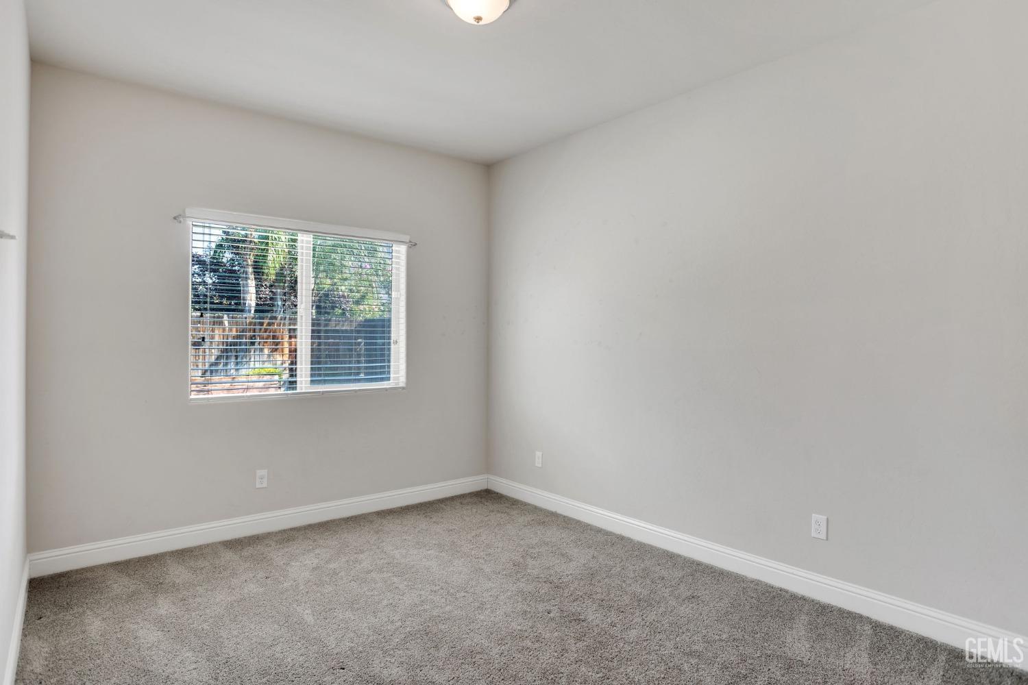 Undisclosed Address Bakersfield, CA 93311 - Photo 33 of 39 an empty room with a window