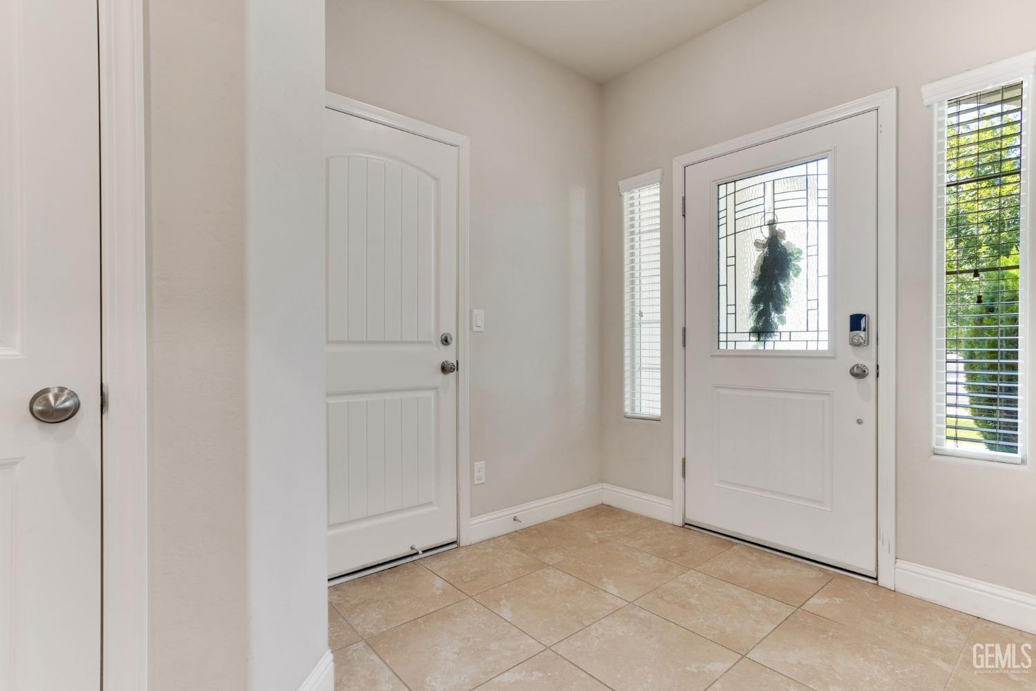 Undisclosed Address Bakersfield, CA 93311 - Photo 6 of 39 a view of an empty room with window and closet area
