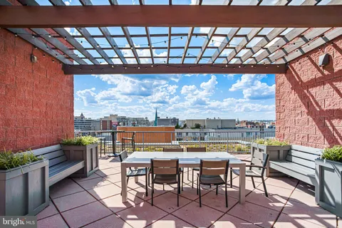 a view of a chairs and table in the terrace