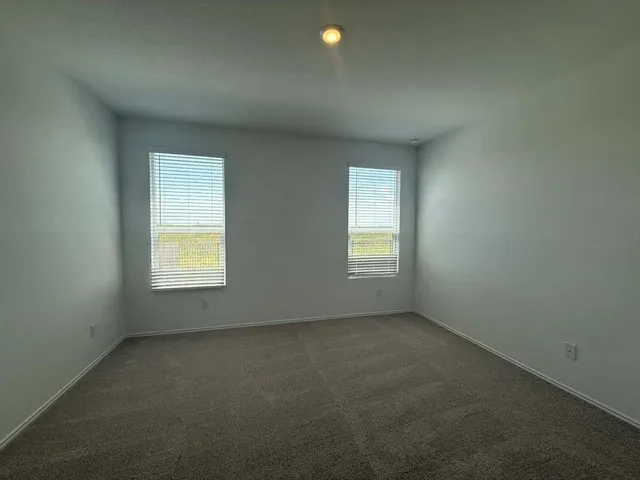an empty room with an entryway