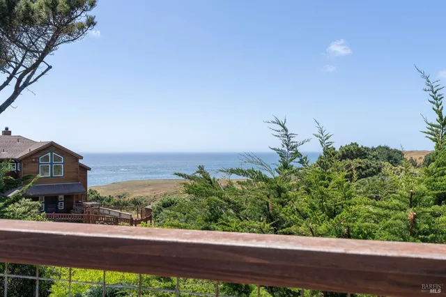 a view of a street with a building in the background