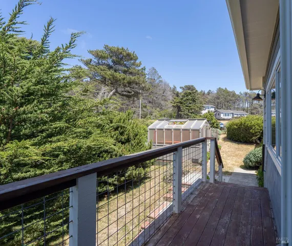 a view of balcony with furniture