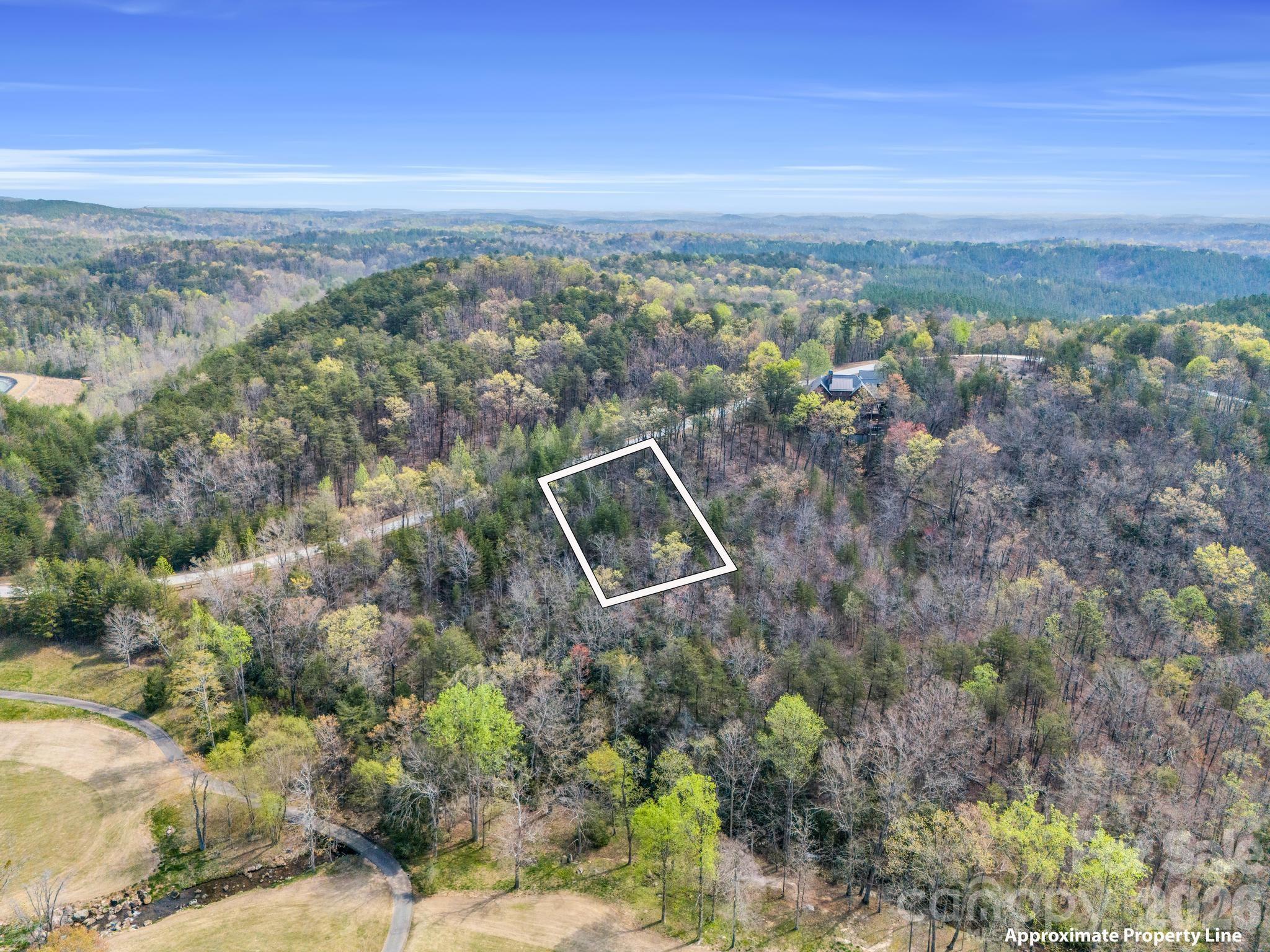 0 Deep Gap Farm Road East Mill Spring, NC 28756 - Photo 6 of 39 an aerial view of a house with a yard