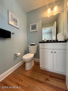 2105 Grand Central Avenue, Unit 1 Lavallette, NJ 08735 - Photo 16 of 33 a bathroom with a toilet a sink and mirror