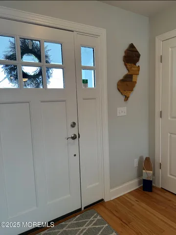 a view of livingroom with furniture and windows