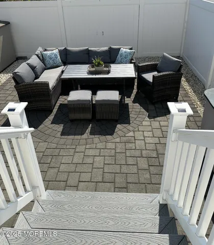 a view of a livingroom with furniture and wooden floor