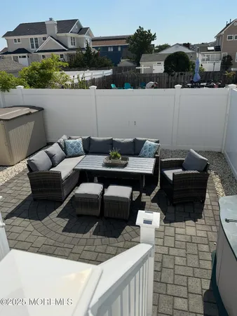 a view of a terrace with furniture