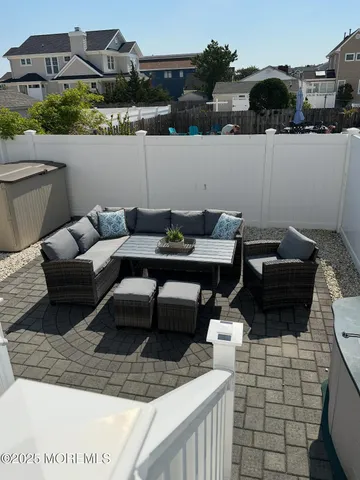 a view of a terrace with furniture