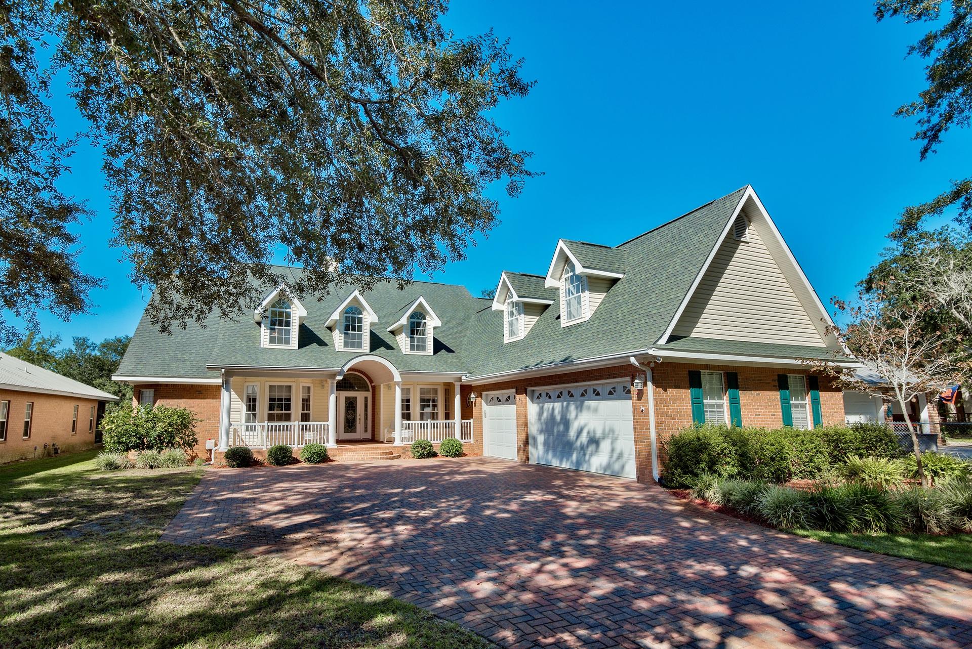 60 Windy Way Santa Rosa Beach, FL 32459 - Photo 3 of 56 front view of a house with a porch