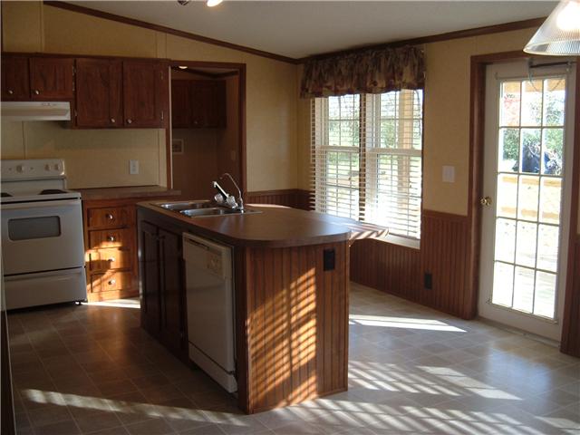 119 Fire Tower Road Dickson, TN 37055 - Photo 5 of 14 Kitchen with island bar & lots of windows.