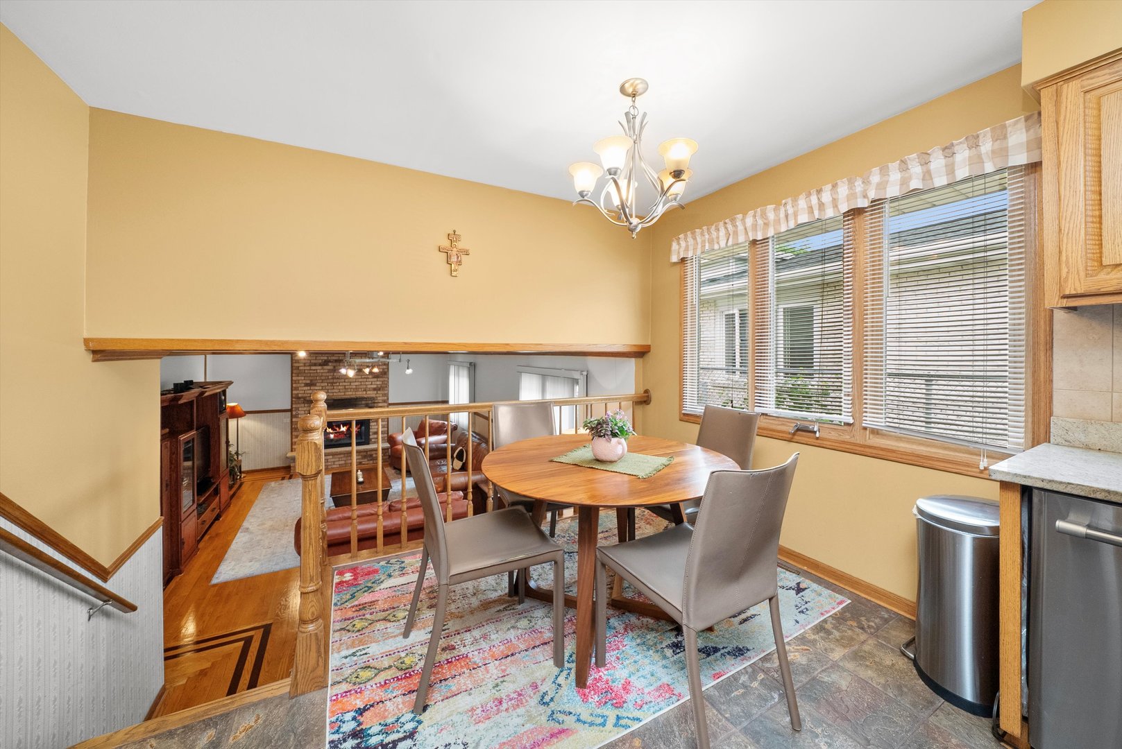 7542 Mason Avenue Burbank, IL 60459 - Photo 15 of 49 a view of a dining room with furniture window and wooden floor