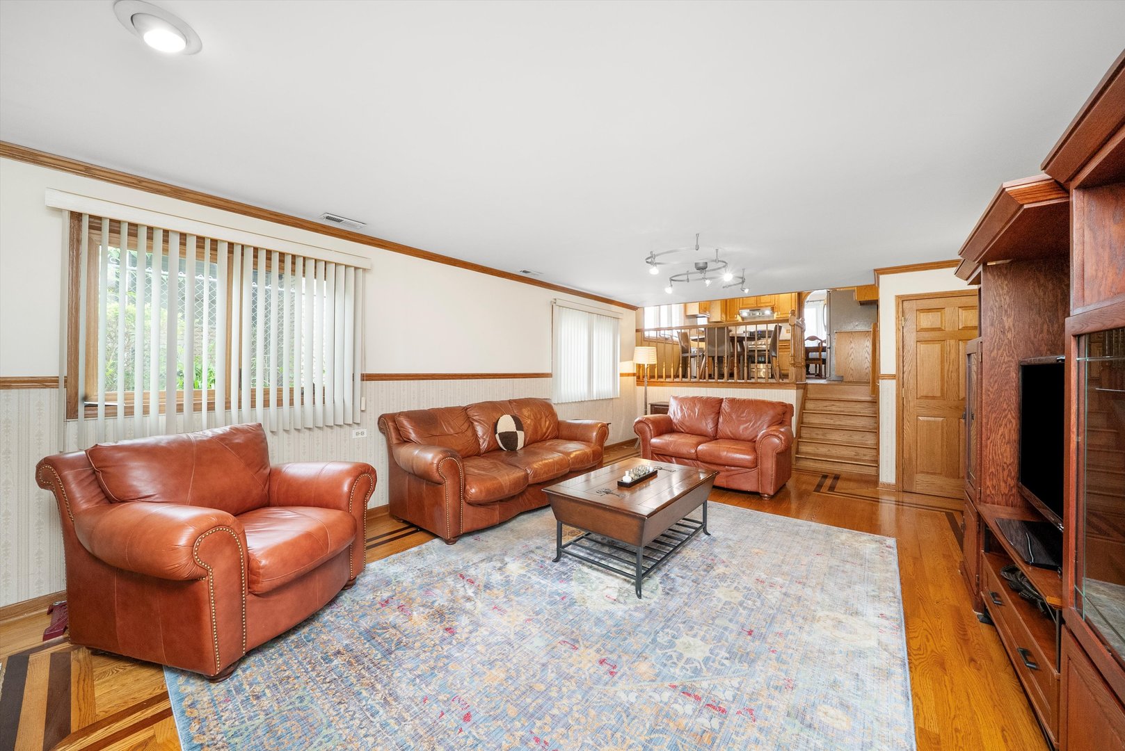 7542 Mason Avenue Burbank, IL 60459 - Photo 18 of 49 a outdoor living space with furniture and a flat screen tv