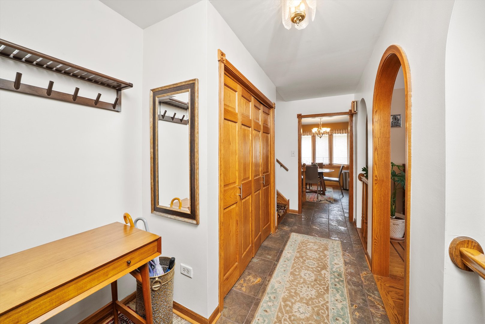 7542 Mason Avenue Burbank, IL 60459 - Photo 2 of 49 a view of a hallway with entryway and wooden floor
