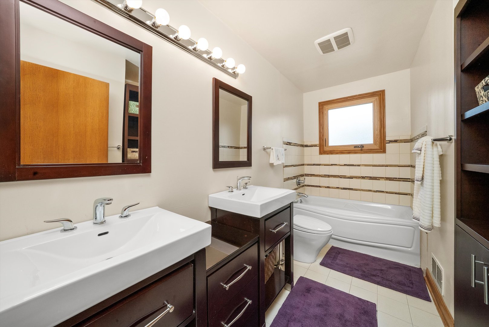 7542 Mason Avenue Burbank, IL 60459 - Photo 26 of 49 a bathroom with a sink and a mirror