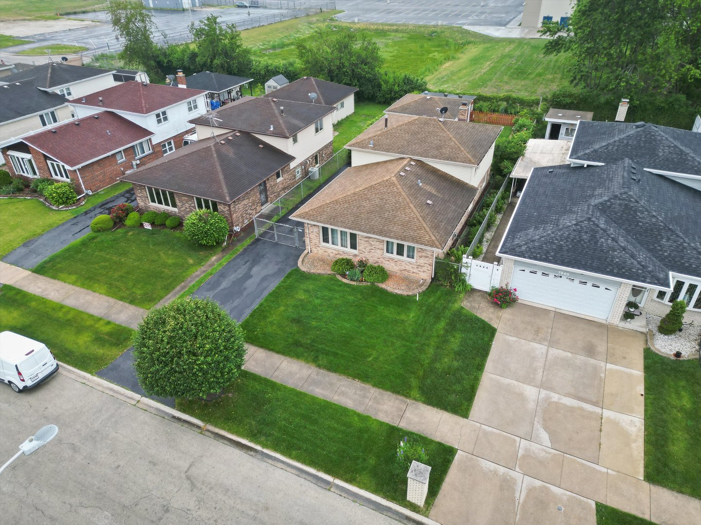 7542 Mason Avenue Burbank, IL 60459 - Photo 41 of 49 a view of multiple houses with yard