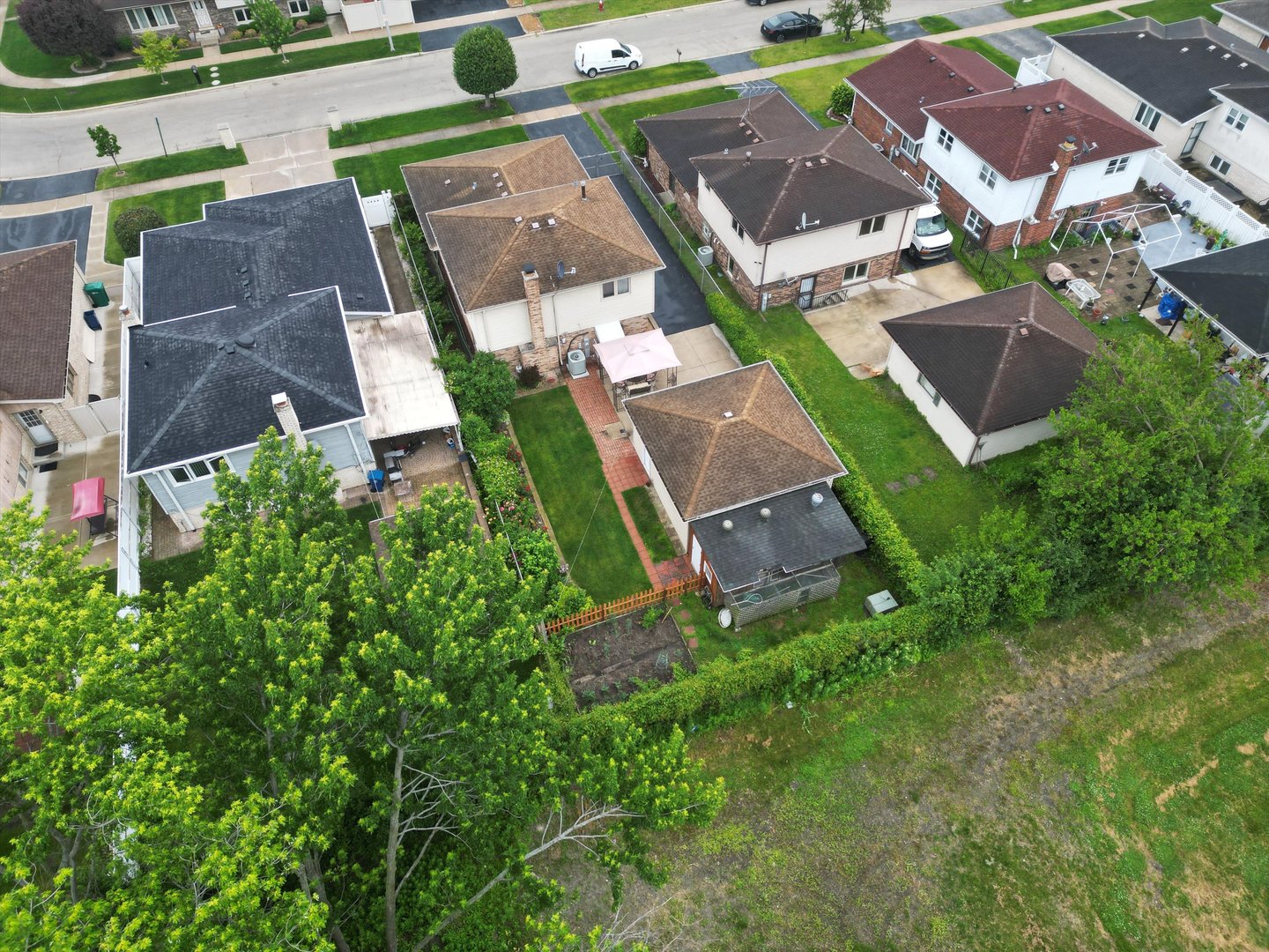 7542 Mason Avenue Burbank, IL 60459 - Photo 43 of 49 an aerial view of a house with garden space and street view