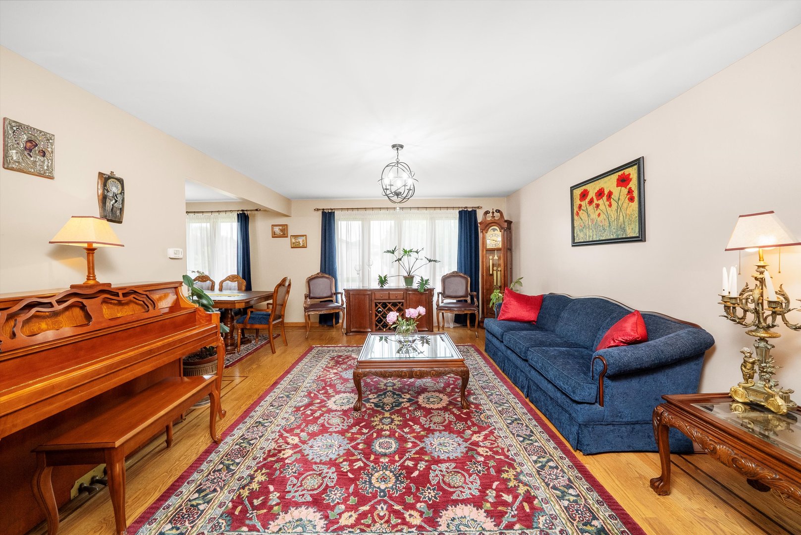 7542 Mason Avenue Burbank, IL 60459 - Photo 7 of 49 a living room with furniture or couch and a lamp