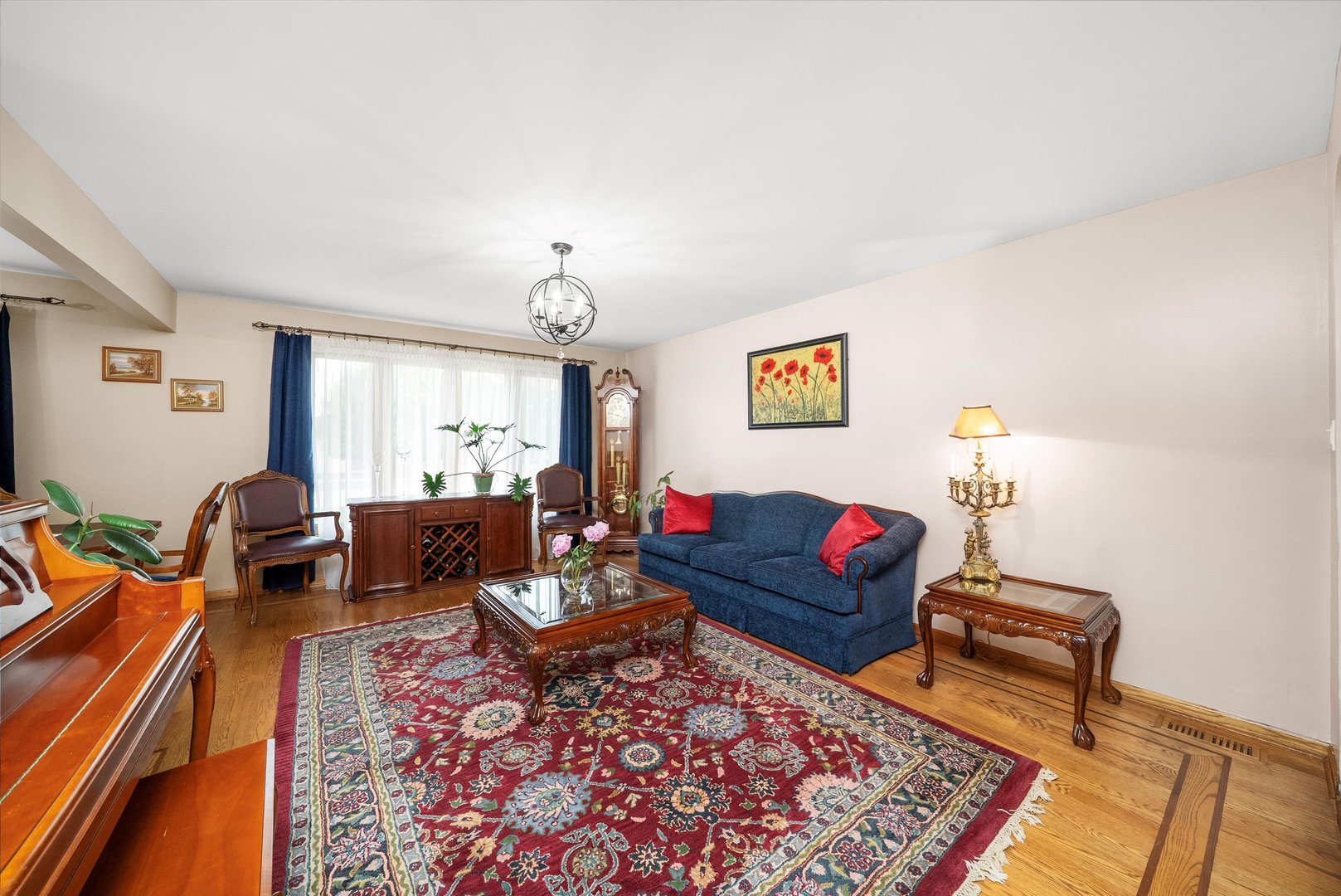 7542 Mason Avenue Burbank, IL 60459 - Photo 8 of 49 a living room with furniture and a rug