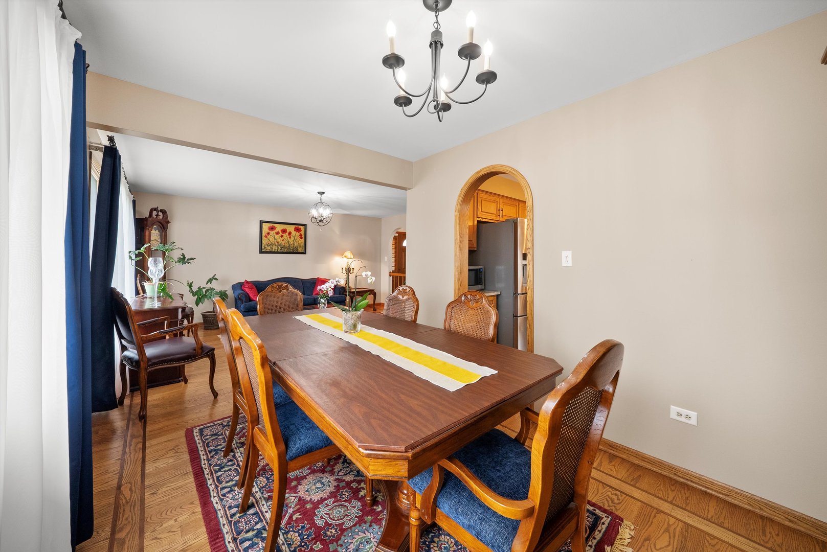 7542 Mason Avenue Burbank, IL 60459 - Photo 10 of 49 a view of a dining room with furniture and a chandelier