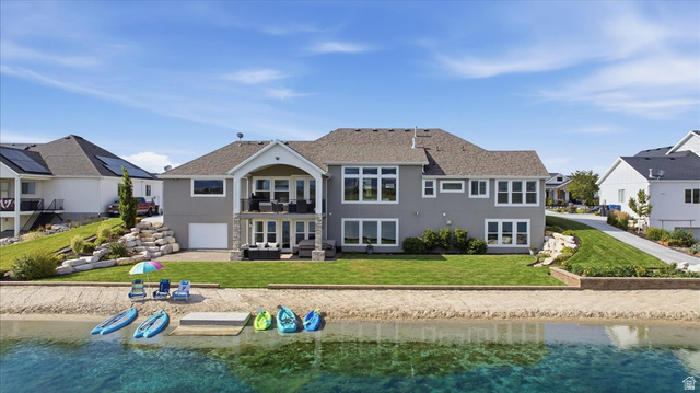 21 Pier Place Tooele, UT 84074 - Photo 101 of 112 Waterfront residence featuring a private sandy beach, direct water access, and a multi-level deck and patio