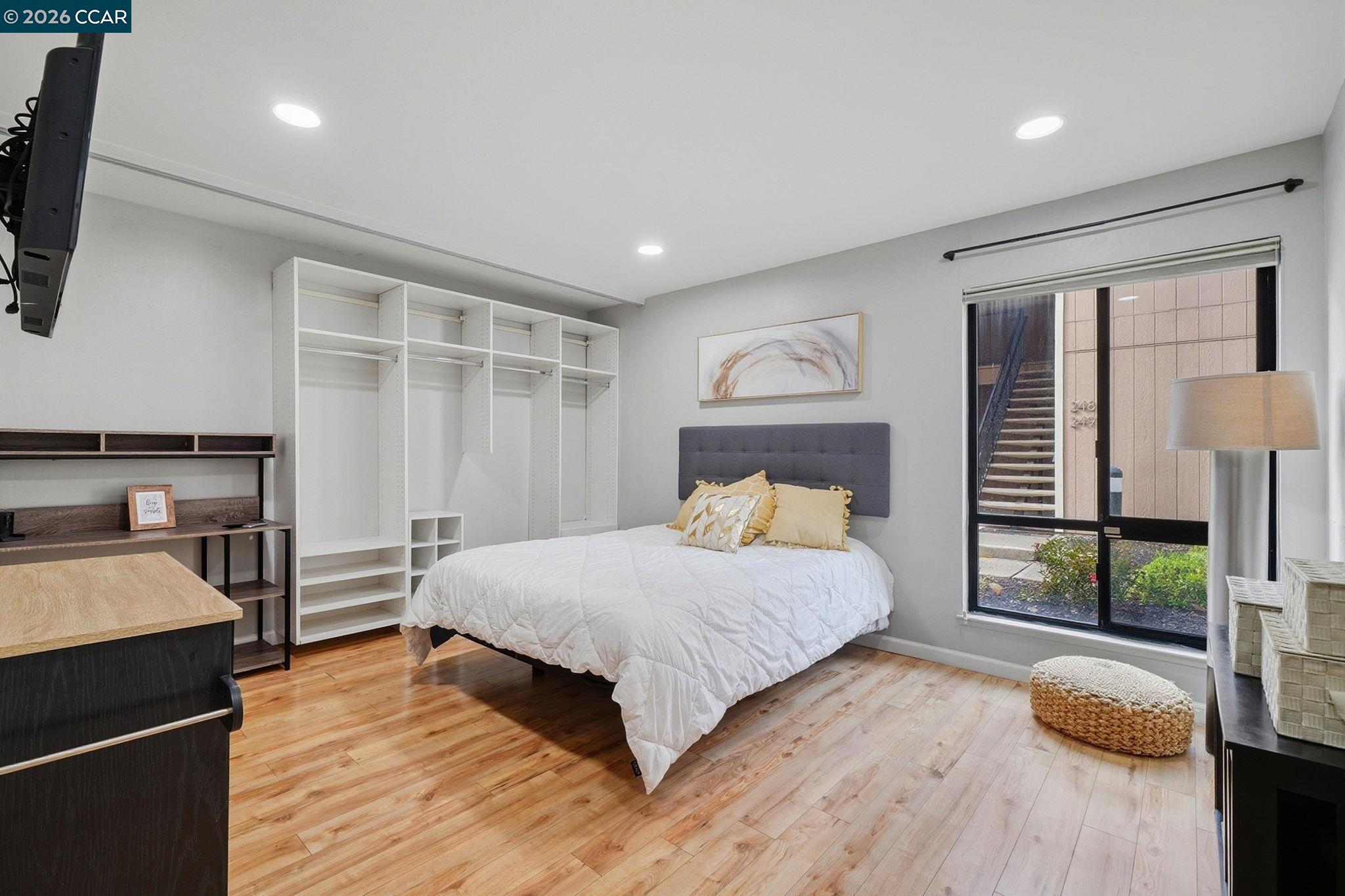 9025 Alcosta Boulevard, Unit 259 San Ramon, CA 94583 - Photo 20 of 40 a bedroom with a bed and a dresser
