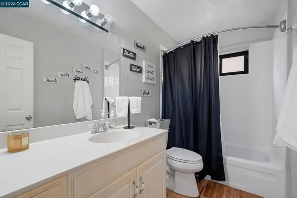 a view of a house with basketball court