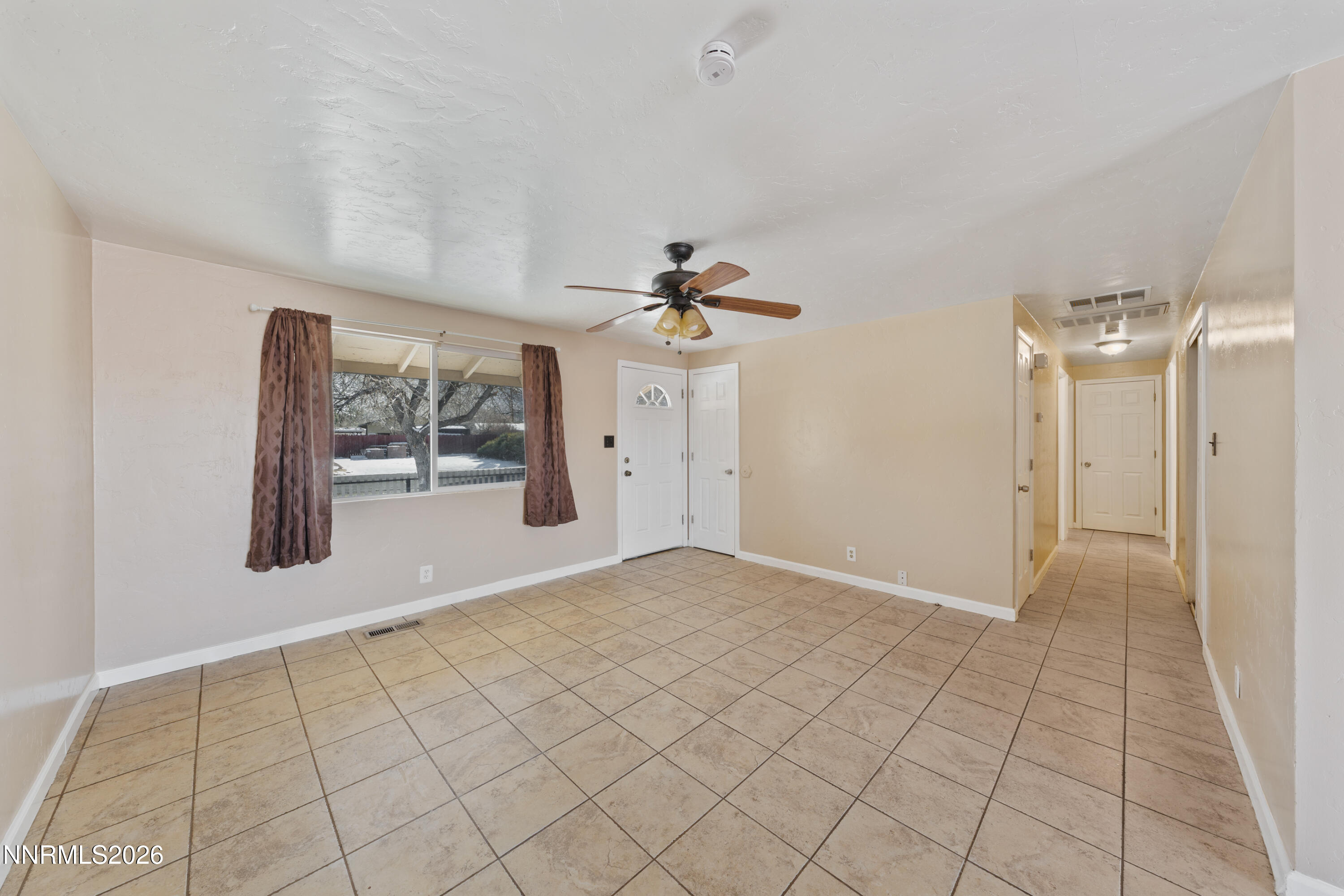 9035 Fremont Way Reno, NV 89506 - Photo 16 of 44 a view of an empty room and window