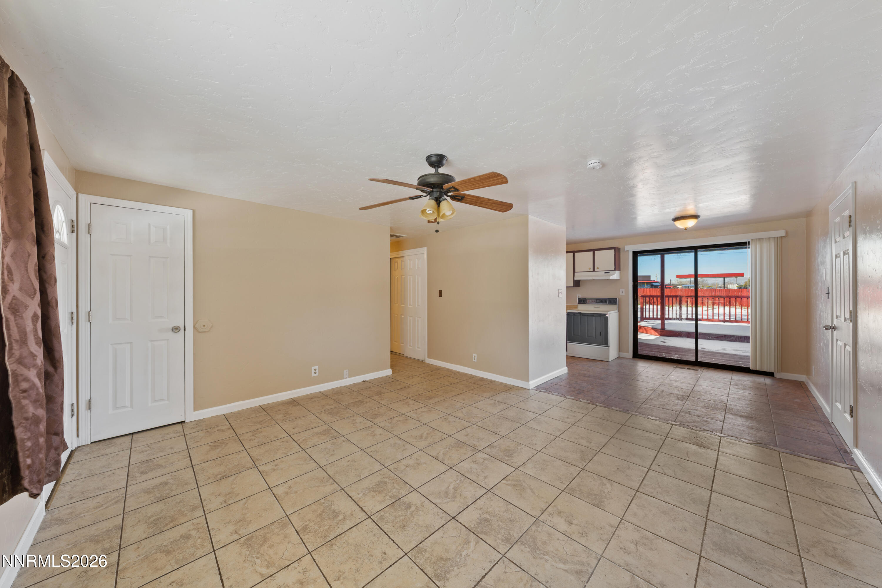 9035 Fremont Way Reno, NV 89506 - Photo 17 of 44 a view of an empty room with a window