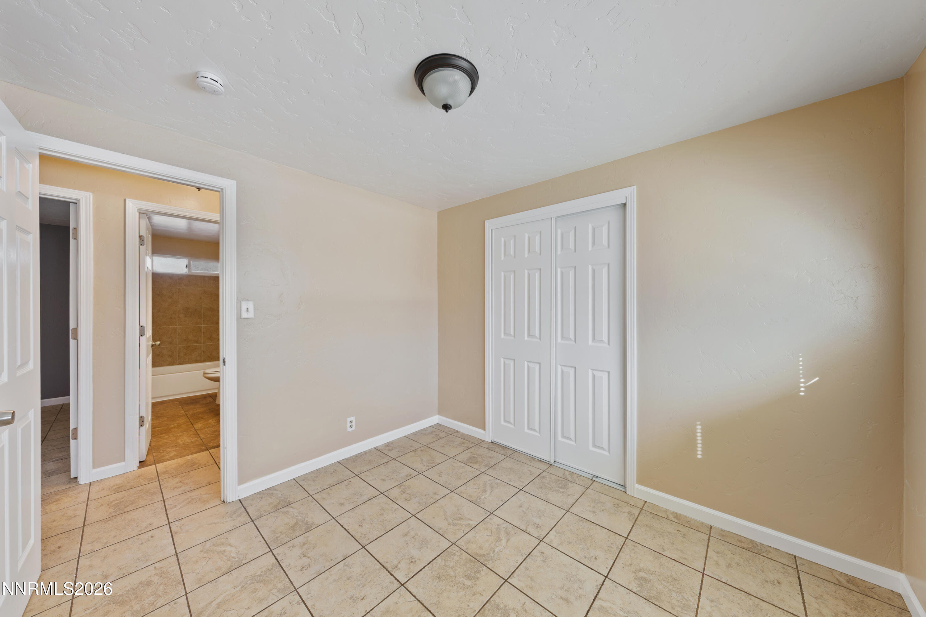 9035 Fremont Way Reno, NV 89506 - Photo 22 of 44 a view of an empty room