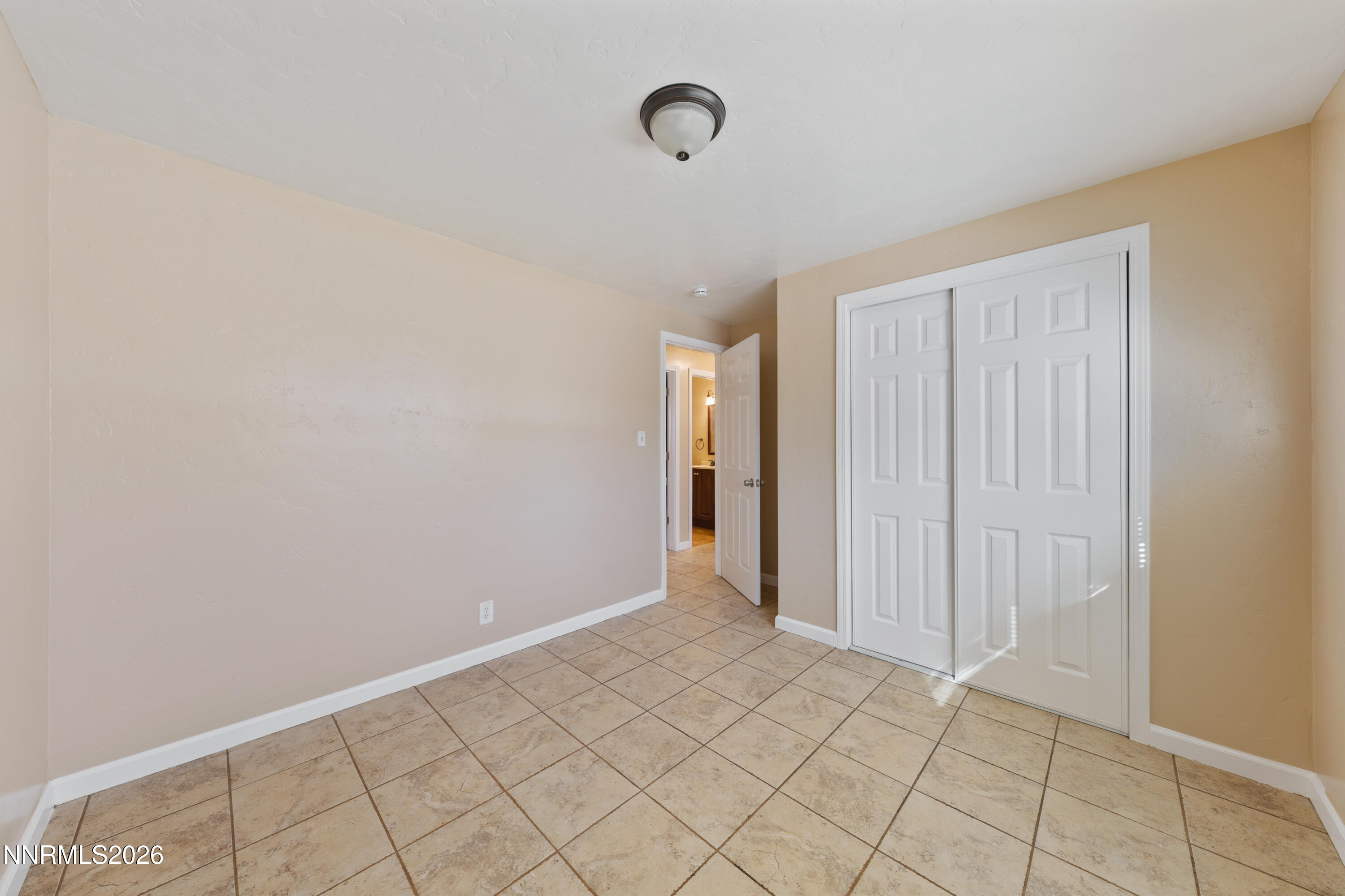 9035 Fremont Way Reno, NV 89506 - Photo 26 of 44 a view of an empty room