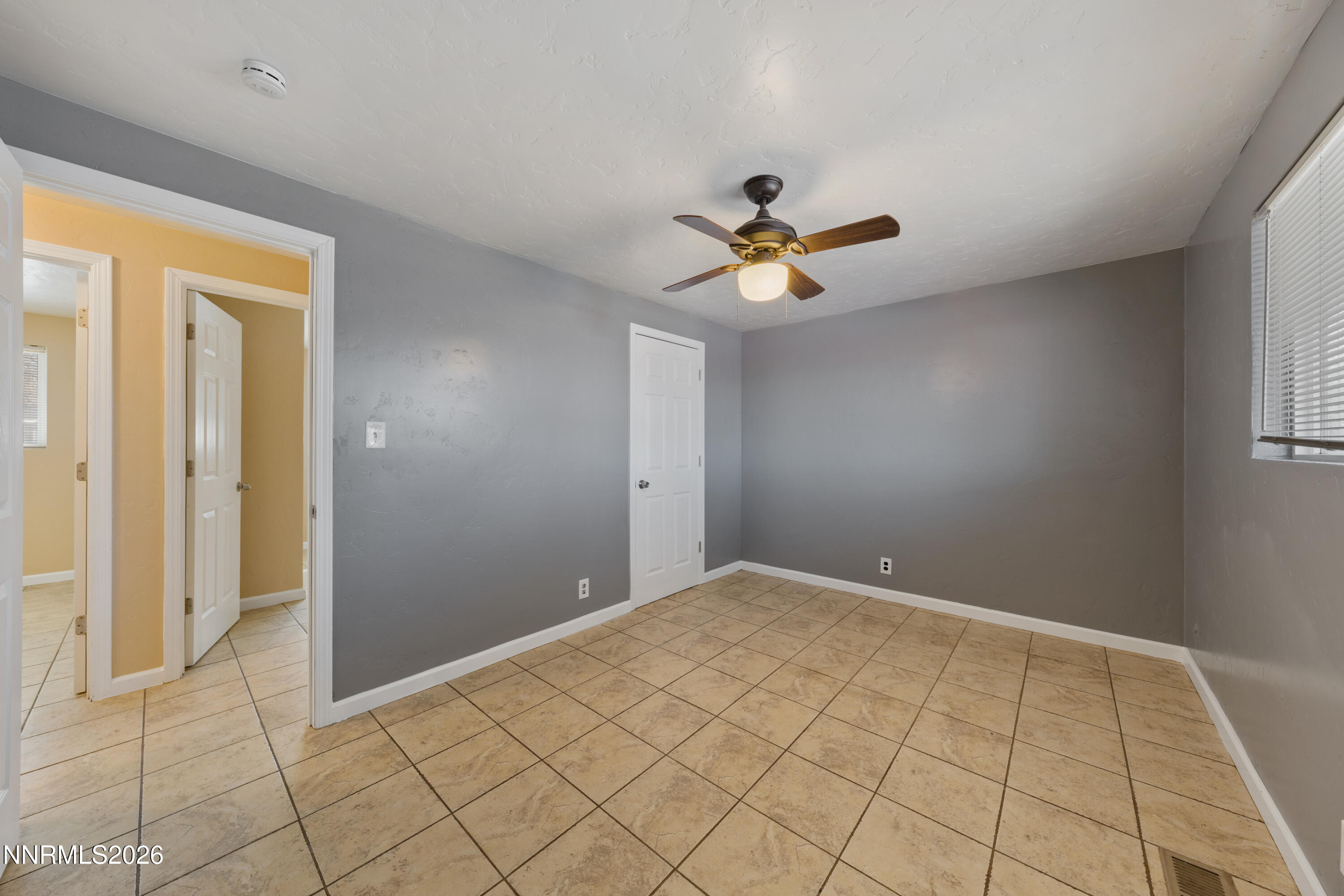 9035 Fremont Way Reno, NV 89506 - Photo 28 of 44 a view of an empty room and window