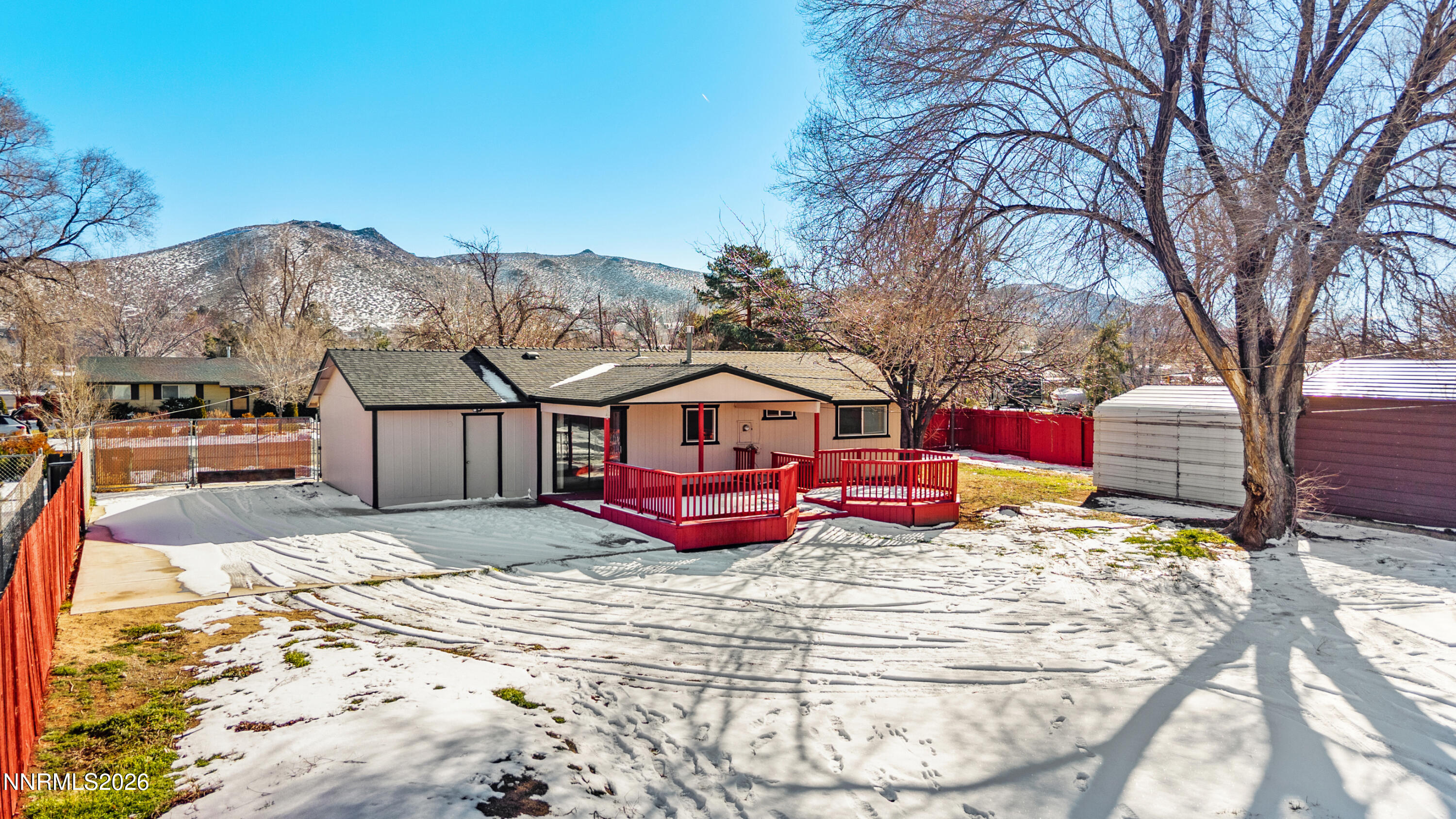 9035 Fremont Way Reno, NV 89506 - Photo 42 of 44 a view of a houses with a yard