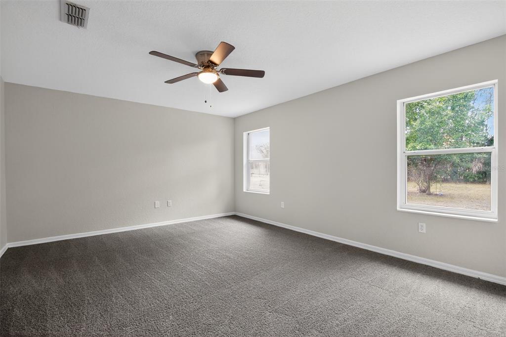 11443 Southwest 78th Circle Ocala, FL 34476 - Photo 15 of 33 a view of an empty room with a window